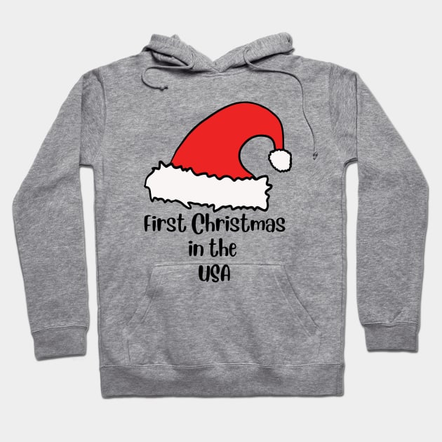 First Christmas in the USA Hoodie by Ashden